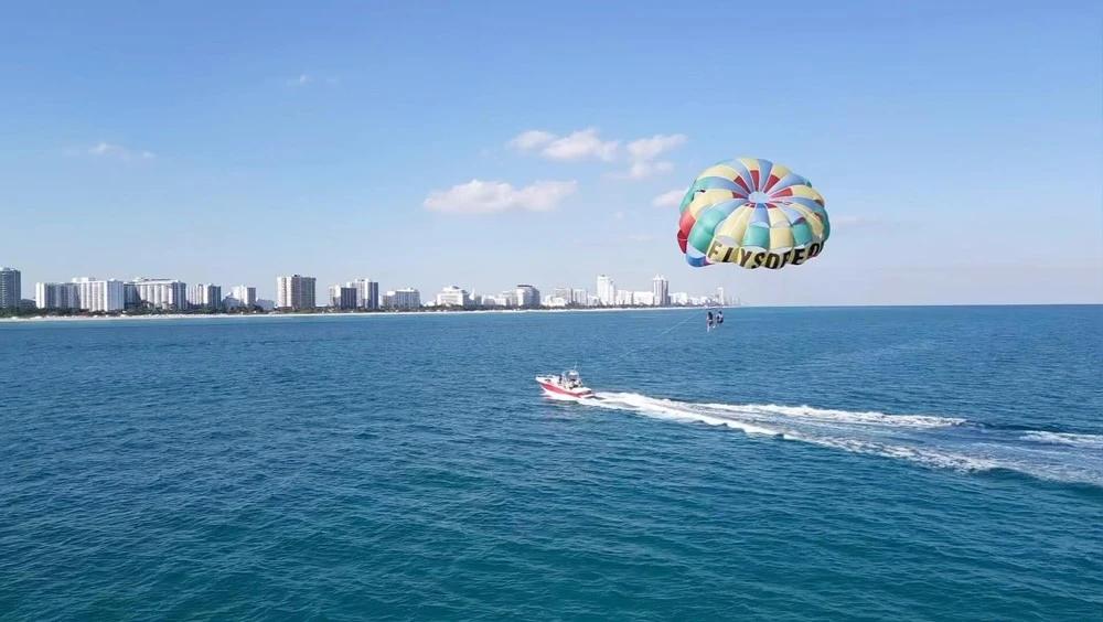 view from boat of people parasailing